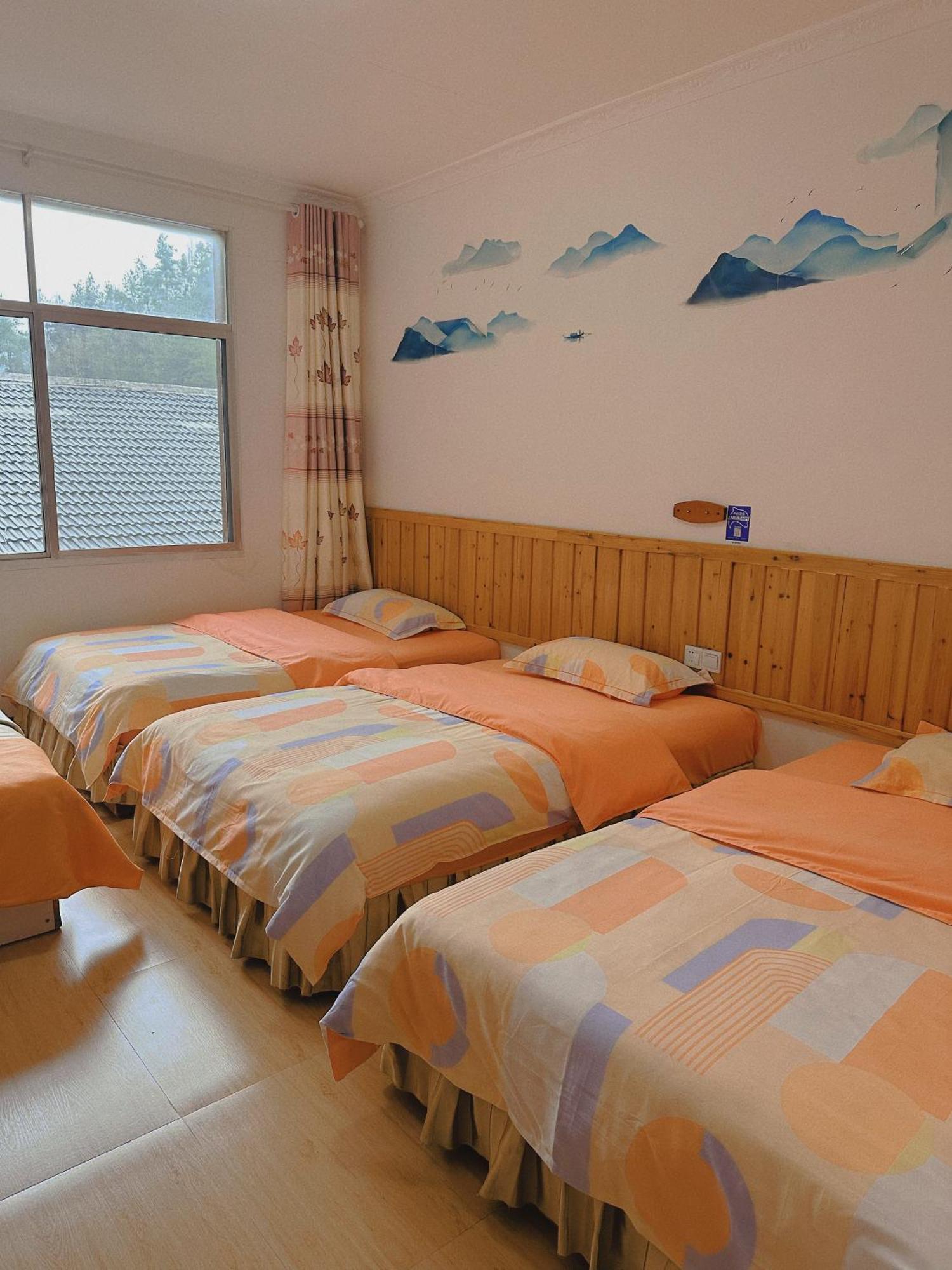 Tongfu Inn Жангжиаже Екстериор снимка